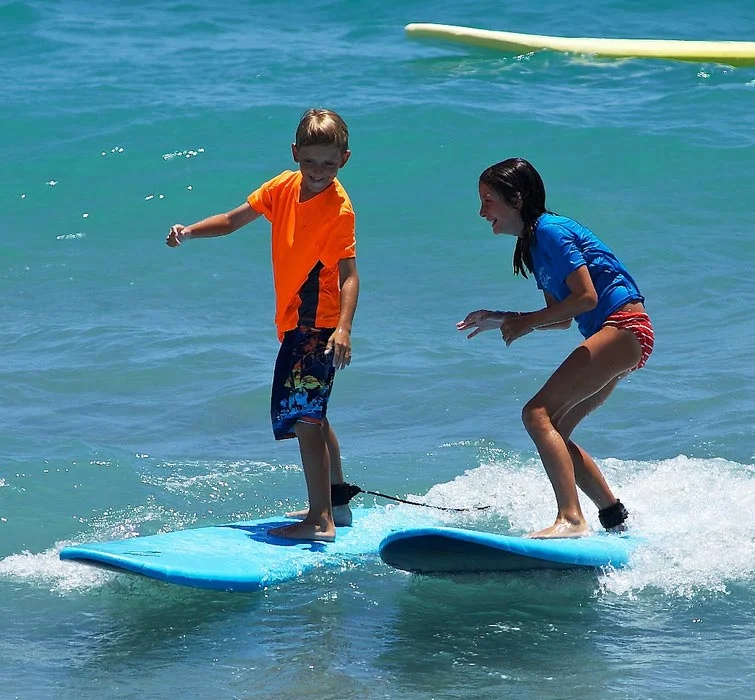 Kids fishing at sunrise during Blue Water Fish Camp at Jupiter